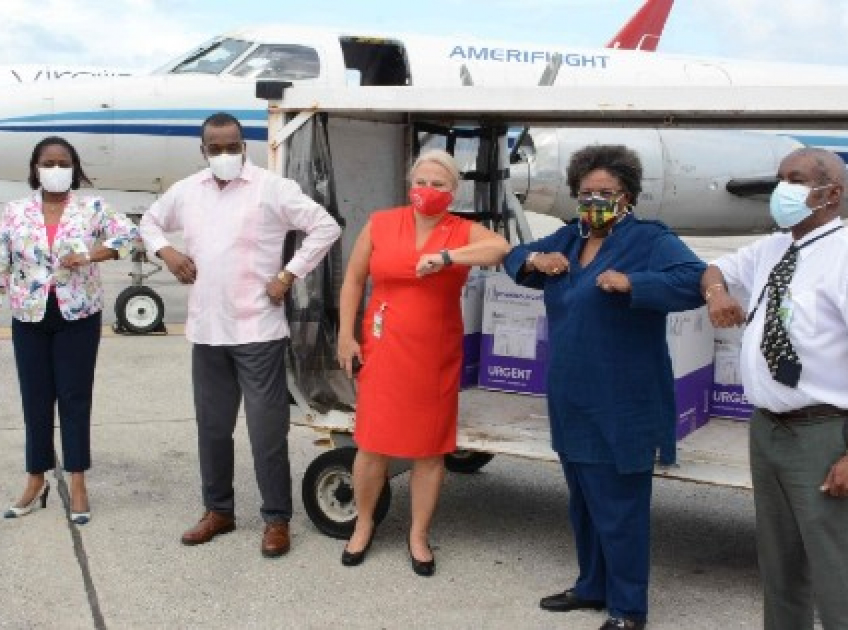 Chargé d’affaires at the High Commission of Canada, Ann Cleminson (centre) handed over the donation to Prime Minister Mia Mottley (second right). Also present for the delivery were (from left) Acting Permanent Secretary in the Ministry of Health and Wellness, Cheryl Alleyne; Minister of Health and Wellness Lt. Col. Jeffrey Bostic; and Chief Medical Officer Dr. Kenneth George.