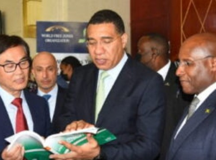 Prime Minister Andrew Holness (center) in discussions with UNCTAD director, James Zhan (left) and Aubyn Hill, Minister of Industry, Investment and Commerce (JIS Photo)