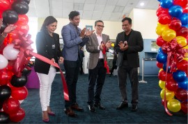 His Excellency Álvaro Enrique Sánchez Cordero, Ambassador Extraordinary and Plenipotentiary, the Bolivarian Republic of Venezuela (second in photo from right) applauds after cutting the ribbon to officially mark the resumption of Caribbean Airlines’ operations to Caracas, during a brief ceremony held at the Piarco International Airport on Saturday May 13th.  He is flanked by Caribbean Airlines Vice President, Maintenance& Engineering, Varma Khillawan (first from right) and Alicia Cabrera, Caribbean Airlines’ Executive Manager Marketing & Loyalty (first from left in photo).