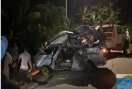 Wreckage of the bus involved in accident being removed from the scene