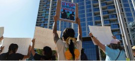 People protest against immigration policies in the US state of California.