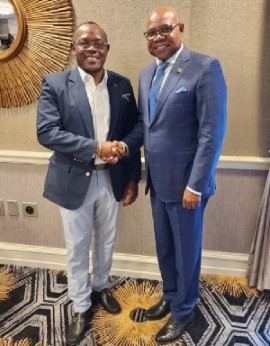Jamaica’s Minister of Tourism, Edmund Bartlett (right) and Bahamas Deputy Prime Minister and Minister of Tourism, Investments and Aviation for the Bahamas, Chester Cooper, shake hands following their talks in New York