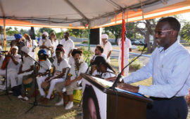 Mr. Denzil Thorpe, Permanent Secretary in the Ministry of Culture, Gender, Entertainment and Sport gives remarks at Remembering Dennis Brown, a cultural gathering to celebrate the 63rd Birthday of the Crown Prince of Reggae. The event was held at Dennis Brown’s resting place in the National Heroes Park in Kingston on Saturday, February 1. Also pictured are members of the Inna De Yard band, who provided entertainment for the event.