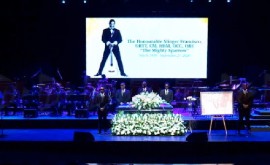The casket bearing the body of the singer, Dr. Slinger Francisco on stage at the National Performing Arts Academy (NAPA) on Friday (CMC Photo)