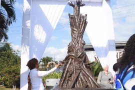 “Lest We Forget” was designed and built by Jamaican artist Trishaunna Henry. The monument was unveiled at the Joy Spence Appleton Estate Rum Experience in tribute to the enslaved people who worked on the Appleton Estate Plantation during slavery.