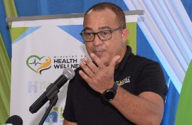 Minister of Health and Wellness, Dr. the Hon. Christopher Tufton, speaks at the Open House & Exhibition ceremony for the rehabilitation of public health facilities in St. Catherine, held at the Church of the Open Bible in Twickenham Park, on Wednesday, August 31. (Photo by Dave Reid, via JIS)