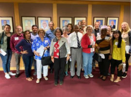 Clergy and congregation members of People Acting for Community Together (PACT) joined Commissioner Levine Cava in support of a community ID program.