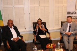 Jamaica’s Ambassador to the United States, Audrey Marks center makes a point during here Online Program Let's Connect with Ambassador Marks at the embassy of Jamaica in Washington DC Last Thursday October 27th, 2022. Ambassador Marks is joined by from left Chief Executive Officer of Passport Immigration and Citizenship Agency, PICA Mr. Andrew Wynter and Non-Immigrant Visa Unit Chief in the Consulate Section of the United States Embassy in Kingston, Mr. Jeff Osweiler. (Photo by Derrick Scott)