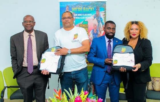 (L-R) Hon. Lennox Andrews, Minister for Economic Development, Planning, Tourism and ICT, Creative Economy, Agriculture and Lands, Fisheries and Cooperatives, Ministry of Economic Development, Planning, Tourism and ICT, Creative Economy, Agriculture and Lands, Fisheries and Cooperatives; George Nicholson, GRW7s; Hon. Ron Redhead, Minister of State with responsibility for Youth, Sports and Culture; Petra Roach, CEO GTA