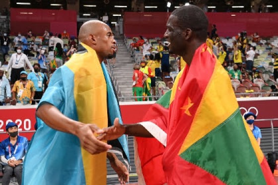 Bahamian Steven Gardiner (left) and Grenadian Kirani James congratulate each other following the men’s 400m final. Jamaican Christopher Taylor finished sixth in a personal best 44.79.