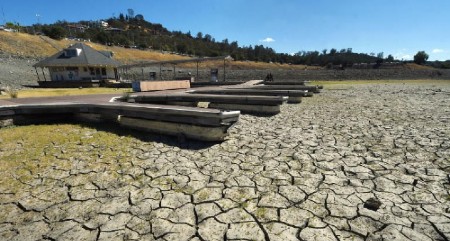 (FILES) This September 17, 2015 file photo shows boat docks sitting empty on dry land, as Folsom Lake reservoir near Sacramento stands at only 18 percent capacity, as the severe drought continues in California. The first nine months of this year have been record-breaking for heat worldwide, in another sign that dangerous global warming continues to mount, US government scientists said October 21, 2015. Last month marked the "highest September temperature in the 1880-2015 record, surpassing the previous record set last year," said the National Oceanic and Atmospheric Administration (NOAA). AFP PHOTO/ MARK RALSTON