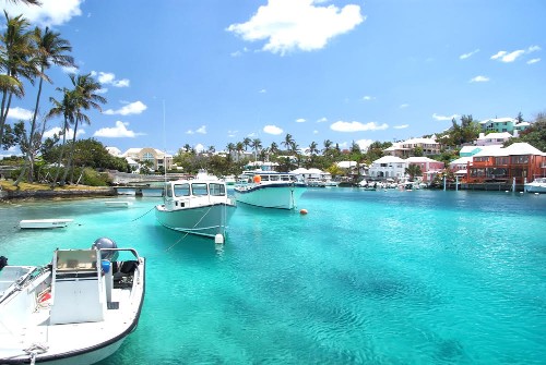 Yacht boats on blue sea water in tropical lagoon in Hamilton, Bermuda. Summer vacation and travelling. Luxury lifestyle concept