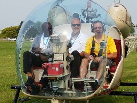 VIP Helicopter Tour – EAA Executives provided Bahamas Ministry of Tourism & Aviation executives with a helicopter tour of the EAA AirVenture Oshkosh grounds, to get a bird’s eye view of the thousands of aircraft and guests attending the ‘Greatest Aviation Show’ in the world. Pictured left to right is: Reginald Saunders, Permanent Secretary and Ellison “Tommy” Thompson, Deputy Director General.