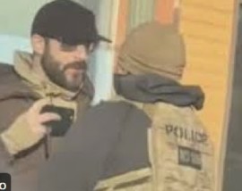 Alex Jeffrey Pretti confronted by an ICE agent minsutes before he was shot and killed