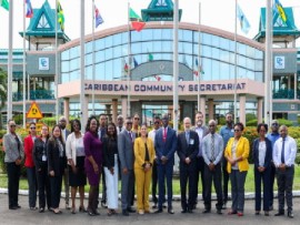 CARICOM Deputy Secretary-General Dr Armstrong Alexis (6th,right) and IDB Country Representative Lorena Solorzano-Salazar with session participants. (CARICOM Secretariat photo)