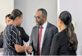 President of the Caribbean Court of Justice (CCJ), Justice Winston Anderson, is greeted on arrival at the Faculty of Legal Sciences of Anton de Kom University
