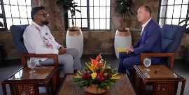 President Irfaan Ali being interviewed by Robert Moore of ITV News. (Credit: DPI)