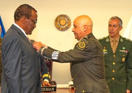 President of Barbados, Jeffrey Bostic, receives the Inter-American Defence Grand Medal from the Inter-American Defence College (IADC) during a ceremony held at the Organisation of American States (OAS) in Washington, D.C. (Photo: Office of the President of Barbados)