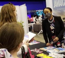 Jamaica Tourist Board Business Development Manager, Southeast USA Tamara Christie promotes Jamaica’s wedding and honeymoon offerings to attendees at the Georgia Bridal Show at Cobb Galleria in Atlanta