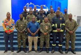 Barbados’ Ambassador to Venezuela, Commander Aquinas Clarke (front row, third from left) poses with personnel from the Barbados Defence Force and the Barbados Fire Service, who received Hero of Venezuela Medals from Acting President, Delcy Rodríguez. (Photo: Barbados Defence Force)