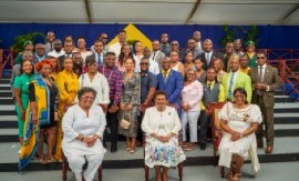 PAHO Director, Dr. Carissa Etienne (front row right, sitting) poses with Barbados Prime Minister Mia Mottley and other recipients of th Humanitarian Awards