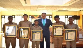 Prime Minister Andrew Holness poses with the students at the ceremony on Tuesday (JIS Photo)