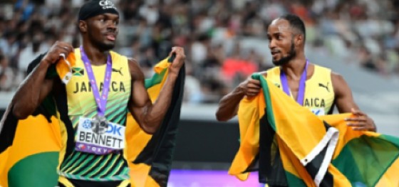 Orlando Bennett (left) and Tyler Mason (right) celebrate after winning silver and bronze in the men’s 110-metre hurdles at the World Athletic Championships in Tokyo.