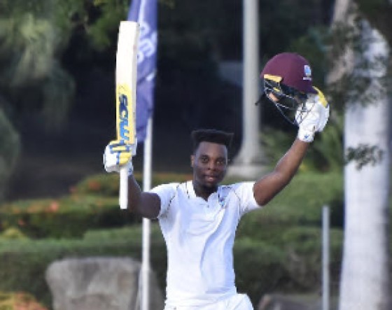 Joshua Bishop celebrates his maiden first class hundred on Sunday. (Photo courtesy CWI Media)