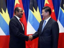 Antigua and Barbuda Prime Minister Gaston Browne (Left) meeting China’s President Xi Jinping during a recent visit to China (File Photo)