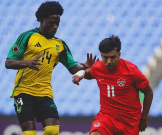 Jamaica’s Duwayne Burgher (left) tracks the run of Canada’s Lucas Lima during their Concacaf U-20 Men’s Championship quarter-final game.