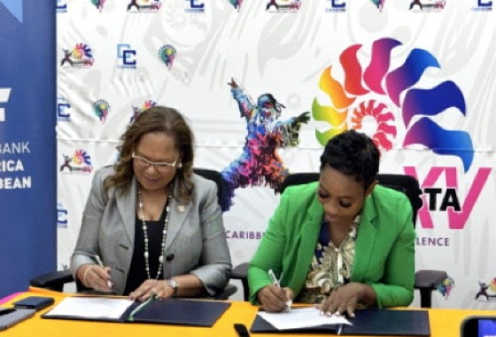 CAF’s regional manager for the Caribbean, Dr. Stacy Richards-Kennedy (left) and Minister in the office of the Barbados Prime Minister, Dr. Shantal Munro-Knight signing the grant agreement on Monday.