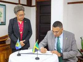 Prime Minister Andrew Holness with CARICOM Secretary General, Dr Carla Barnett.
