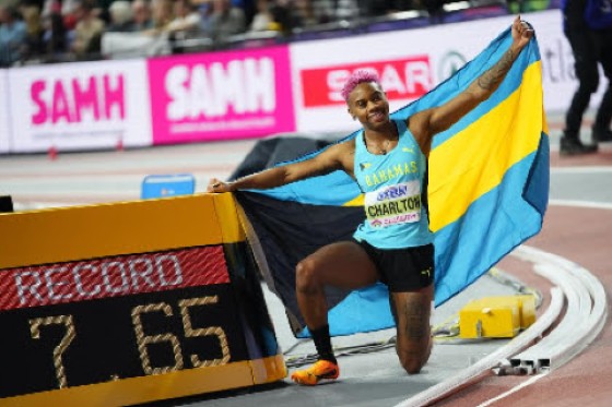 Bahamian Devynne Charlton celebrates her new world record at the World Indoor Championships.