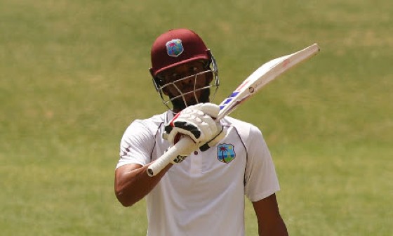 All-rounder Roston Chase celebrates his 10th Test fifty on the final day of the first Test against Australia.