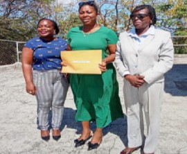 Newly sworn in Opposition Leader, Emmalin Pierre, flanked by her colleagues Kate Lewis Peters and Dr. Clarice Modeste-Curwen.