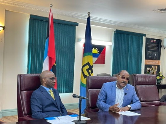 Prime Minister Gaston Browne (Right) and Antigua and Barbuda Ambassador to CARICOM, Dr. Clarence Henry at the services conference on Friday (CMC Photo)