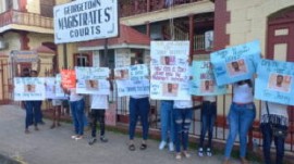 Family and friends of one of the accused men calling for his release outside the Magistrates’ Court on Tuesday