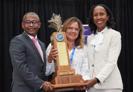 Patricia Affonso-Dass (center) with Barbados Minister of Tourism Ian Gooding-Edghill and Renée Coppin, Chairman of the Barbados Hotel and Tourism Association, in Montego Bay.