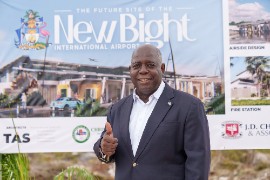 Prime Minister Phillip Davis addressing the ground breaking ceremony for the airport at Cat island.