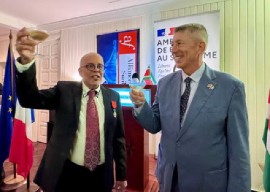 DR. Ruben Del Prado (r) thanks everyone for his French decoration, which he received from French Ambassador Nicolas de Lacoste on Tuesday night.