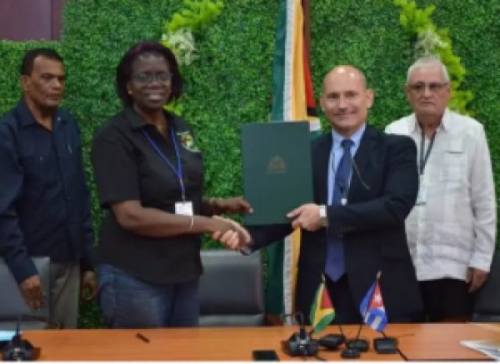 Permanent Secretary of the Ministry, Delma Nedd, and Cuban Ambassador to Guyana, Jorge Francisco Soberón Luis