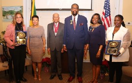 The recipients of National Honours pose for a photograph with Jamaica’s Ambassador to the United States Her Excellency Audrey Marks (second from left) following the ceremony held at the Jamaican Embassy in Washington. At far left is GG Diaspora awardee Dr. Trudy Hall; Ambassador Marks, Professor Donald J. Harris (Order of Merit recipient); Mr. Michael London (Order of Distinction for his work in the creative industries); Security Attaché Superintendent Gloria Davis-Simpson ( BH{M}) for contribution to the Jamaica constabulary; and Ms. Cassandra Campbell Governor General’s Jamaica Diaspora Achievement Awardee For her contribution to small business development. (Photo courtesy of Derrick Scott)