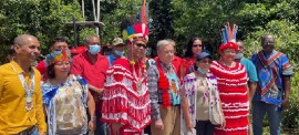 UN Secretary-General António Guterres (center) meets with members of agricultural cooperatives led by indigenous women and men in Pierre Kondre- Redi Doti Village, in Suriname's tropical forest belt. (Photo credit: UN News/Laura Quiñones)