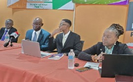 PCP leader, Lynette Eastmond, with other members of the coalition at the news conference.