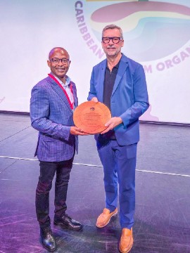 CTO Chairman Ian Gooding-Edghill (left) with Royal Caribbean International President and CEO Michael Bayley after the Iconic Summit