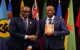 CARICOM chairman and St. Lucia’s Prime Minister Phillip J Pierre (left) and the President of the Territorial Collectivity of French Guiana, Gabriel Serville, during the CARICOM summit in St. Lucia in July.