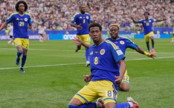 Livano Comenencia (8) celebrates after scoring Curacao’s first-ever goal at a FIFA World Cup against Germany on Sunday.
