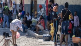 A group of displaced people hosted in a school in the centre of Port-au-Prince, Haiti. (IOM Photo)