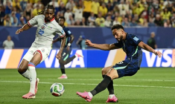 Matheus Cunha (right) scored twice for Brazil against Haiti.