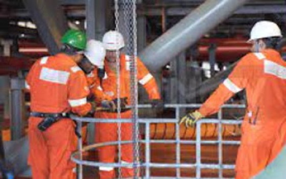 Oil workers in Guyana (File Photo)